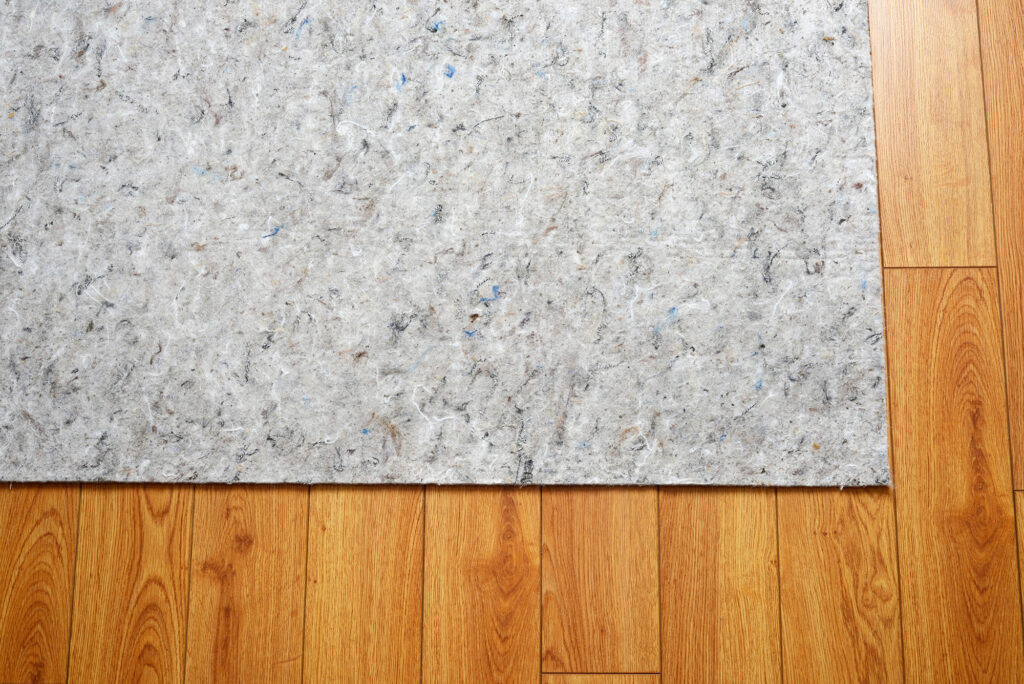 Area rugs on hardwood floor